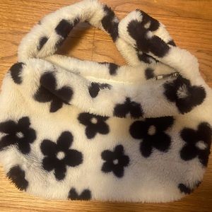 Fluffy white bag with navy blue/black flowers